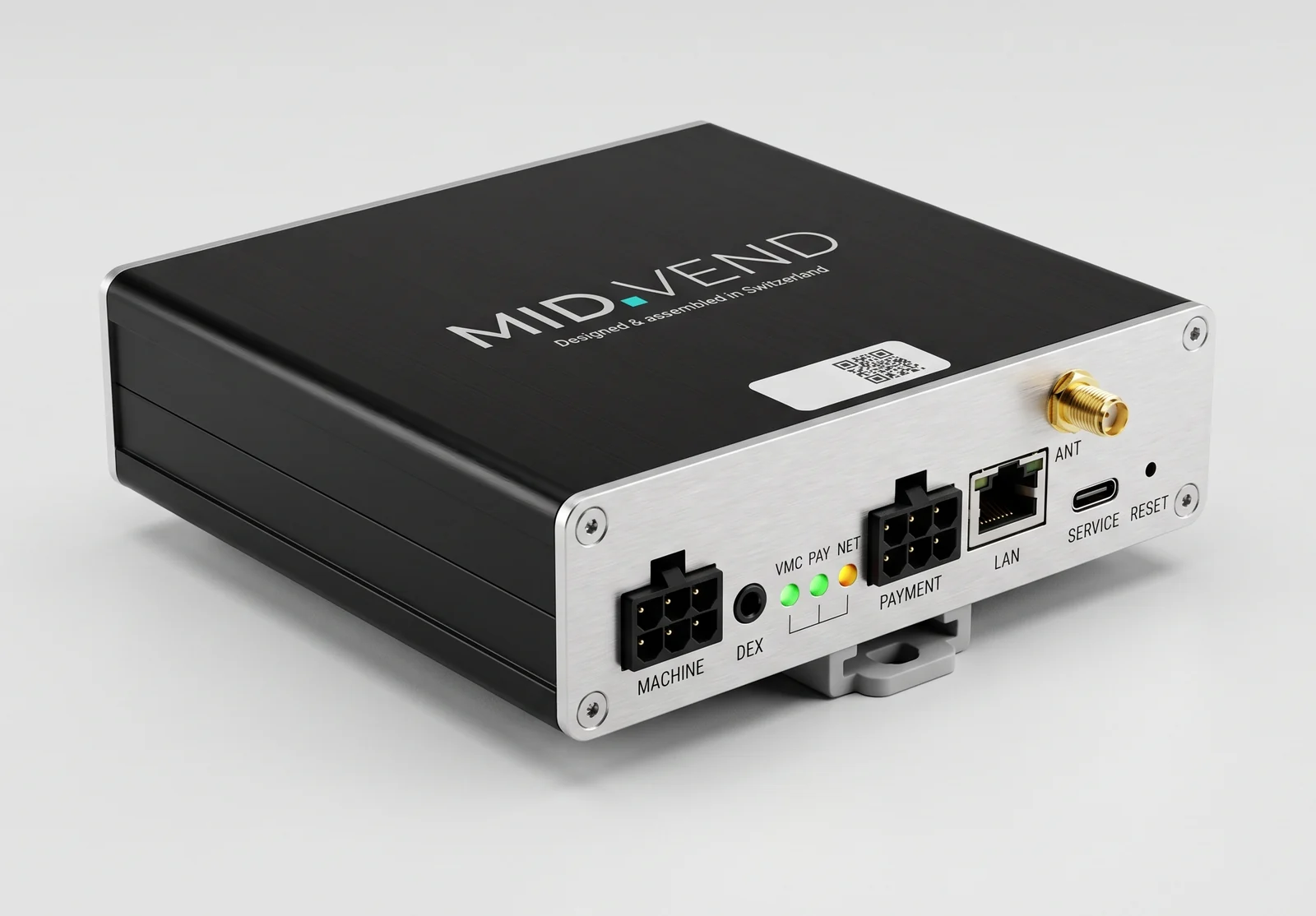 Die MIDVEND-Box: schwarzes Alu-Gehäuse mit gebürsteter Frontplatte, Anschluss MACHINE für den Automaten, Anschluss PAYMENT für die Peripherie, dazu LAN, Antenne und drei Statusleuchten.